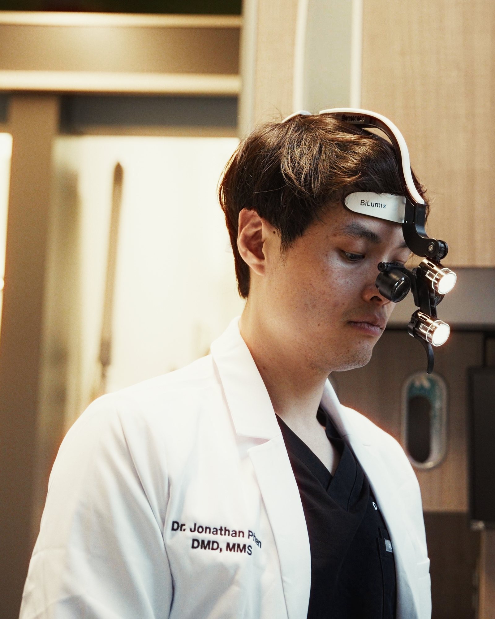 Dr. Phen wearing magnifying loupes